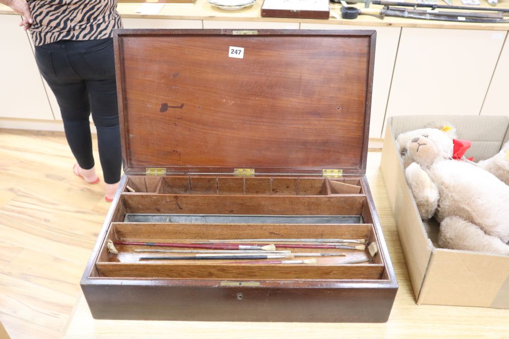 A 19th century mahogany artists paint box including brushes